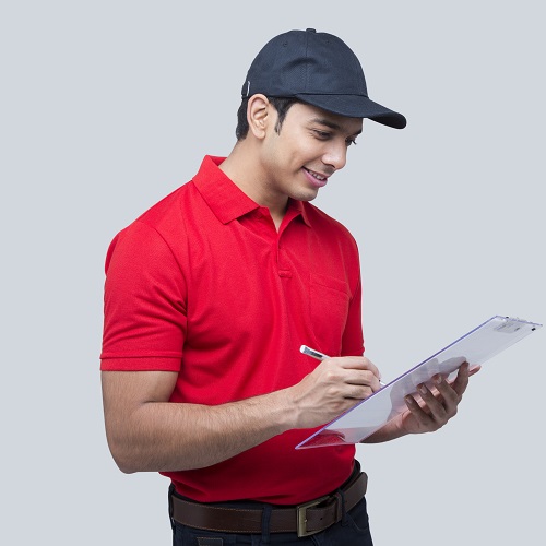 Indian delivery man in Red uniform stock photo